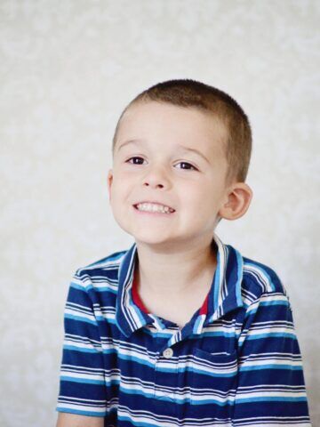 CHOC patient Ian, who has epilepsy, smiles for the camera