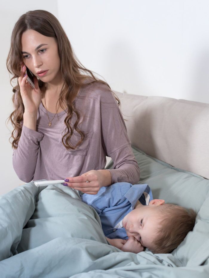 boy not feeling well, mom on the phone