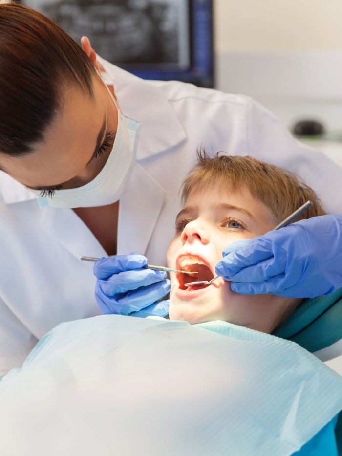 child at the dentist