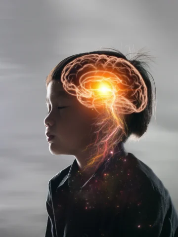 child with brain model abstractly superimposed