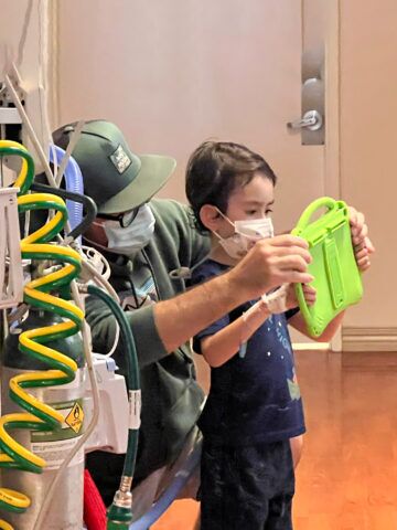 Patient playing Choco's Undersea Adventure AR module