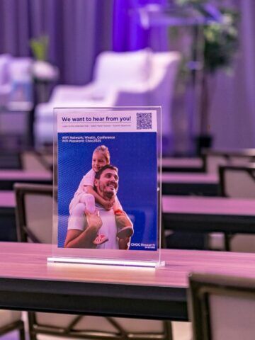 Conference flyer on table