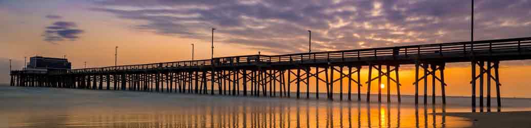 sunset behind a pier in southern california
