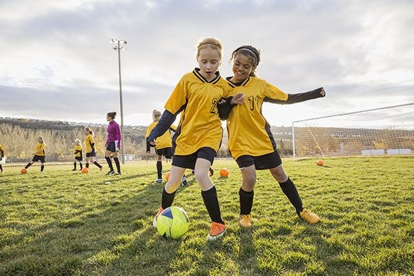 Kids playing soccer